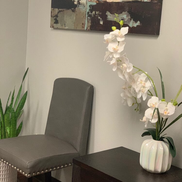 A vase of flowers sitting on top of a table.